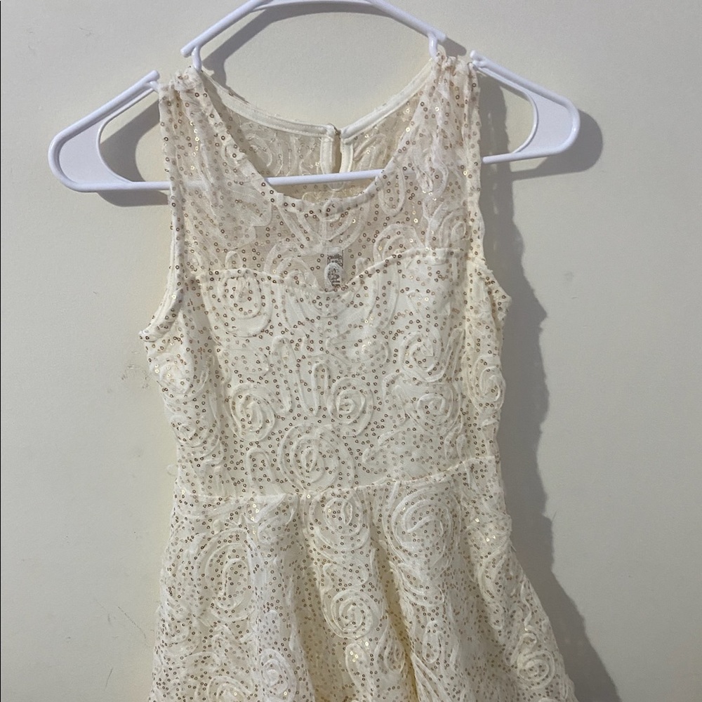 Cream and golden sparkly dress